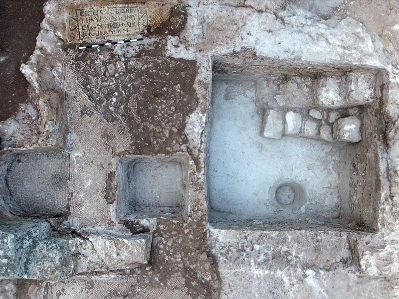 The ancient winepress and inscription uncovered at Tzur Natan.